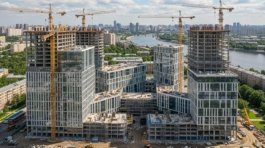 Exterior view of the GreenLade mixed-use development with residential towers, office podium and lifestyle plaza by Firat Projects